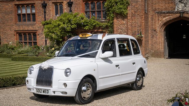 OLYMPIA - White London Taxi used only for weddings 2012 London Olympics